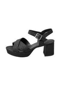 Sandalias de plataforma negras con purpurina, con correas entrecruzadas, hebilla en el tobillo y diseño de tacón bloque, que cuentan con una superficie lisa y texturizada.
