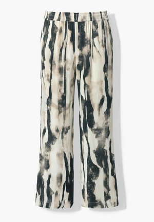 Locker sitzende Hose mit elastischem Bund, mit einem abstrakten Muster aus schwarzen und beigen vertikalen Pinselstrichen auf hellem Hintergrund.