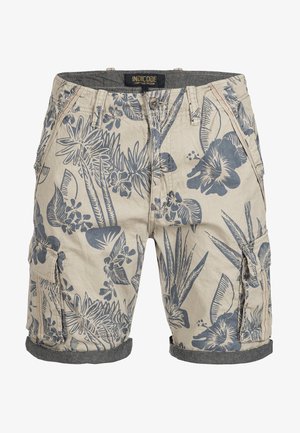 Beige shorts med blå blomster mønstre, med opsmøgte kanter, sidelommer og knaplukning. Fremstillet af let væv.