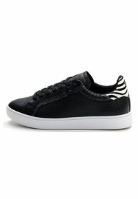 Black sneakers with a textured leather upper, featuring a white rubber sole, decorative black and white striped accents at the back.