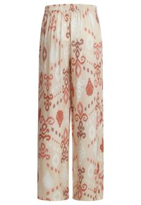 Lightweight, beige pants with a patterned design in red and white. Features an elastic waistband and wide-leg silhouette. Soft fabric texture.
