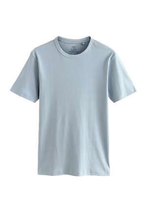 Camiseta de manga corta azul claro hecha de tejido acanalado. Presenta un cuello redondo y un corte recto sin patrones ni acentos adicionales.