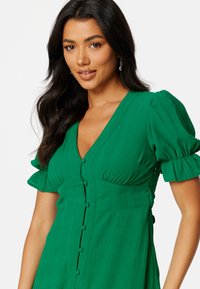 Bubbleroom V-NECK BUTTONED MIDI DRESS - Denní šaty - dark green
