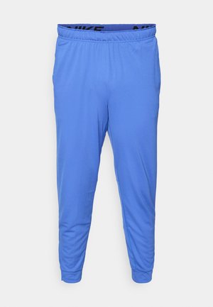 Men's blue athletic pants made from lightweight fabric, featuring an elastic waistband with a black logo and tapered cuffs at the ankles.