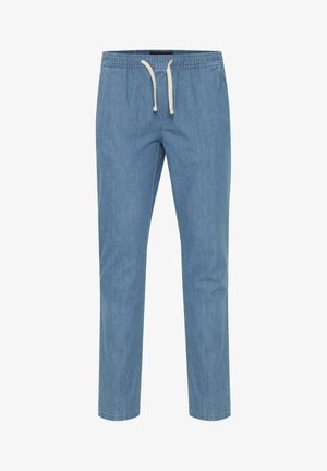 Heledad sinine denimpüksid elastse vöökoha, nööride sulgemise ja kitsenevate jalgadega. Sile tekstuur, ilma nähtavate mustrite või kaunistusteta.