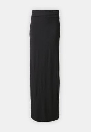 Must mustriga, põrandani ulatuv seelik, mis on valmistatud pehmest ja venivast kangast, kitsaste vöökohtadega. Lihtne, sile disain ilma mustrite või kaunistusteta.