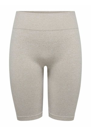 Sømløse beige højtaljede biker-shorts med tekstureret øverste bånd og glat stof i midt-lår længde.