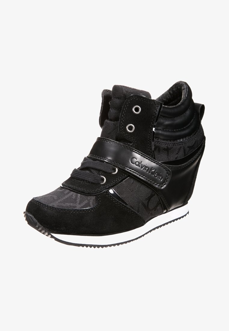 Black high-top sneaker featuring a mix of suede and mesh materials, side strap with logo, padded collar, and textured sole.