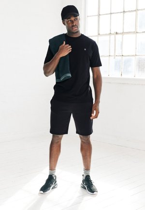 Next, REGULAR FIT - ACTIVE TRAINING DIVISION T-SHIRT  . - T-shirt con stampa - black