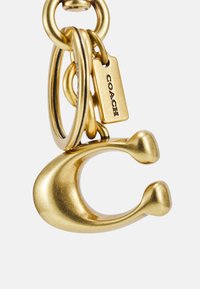 COACH SIGNATURE BAG CHARM - Keyring - brown