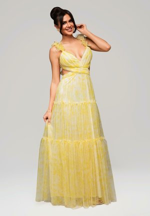 Gelbes Blumenkleid im Maxi-Stil mit durchscheinendem Stoff, Rüsche-Trägern, tiefem V-Ausschnitt, ausgeschnittenen Seiten und gestuften Rockdetails.