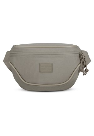 Beżowa płócienna nerka z przednią kieszenią na zamek błyskawiczny, podwójnymi suwakami i prostokątną naszywką z logo umieszczoną na środku przedniego panelu.