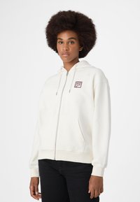 Fila APPAREL LAGRIO  - Vetoketjullinen college - egret