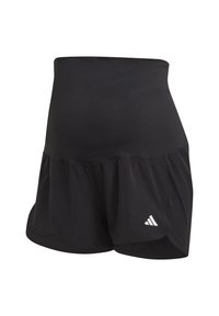 Short de sport noir taille haute avec un ourlet froufroutant et un petit logo Adidas blanc en bas à gauche.