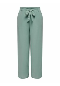 Ljust gröna vida byxor i mjukt tyg, med knytmidja, strukturerad design och slät textur med minimala sömmar.