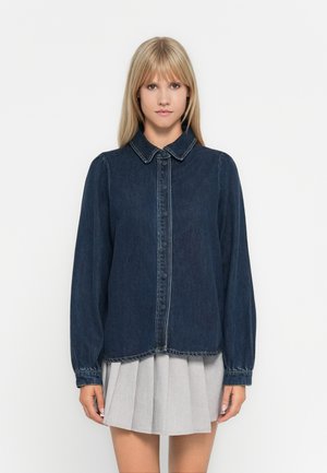 Denim shirt with a collar, dark blue fabric, buttoned front, long sleeves with gathered cuffs, and a slightly cropped hemline.