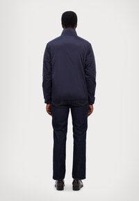 EA7 Emporio Armani GIUBBOTTO UNISEX - Viegla jaka - armani blue