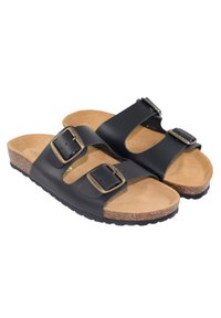 Chanclas negras con dos correas ajustables con hebillas, una plantilla de ante marrón claro y una suela de corcho con superficie texturizada.