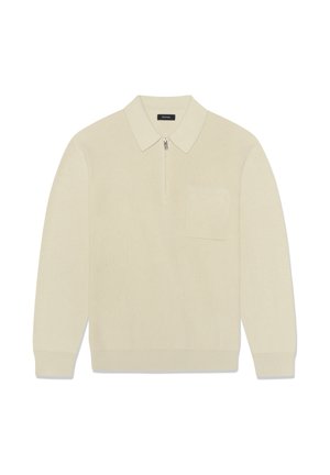 Strikket pullover, off-white, med lynlåshals, lange ærmer og en brystlomme foran. Har en ribbet tekstur og tætsiddende manchetter.