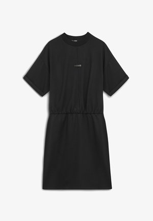 Black short-sleeve dress made of soft fabric, featuring a cinched waist, crew neck, and a rectangular metal accent on the front.