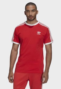 adidas Originals - STRIPES TEE UNISEX - T-shirt con stampa - red Immagine in miniatura 1