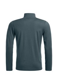 Long-sleeve, polo-style shirt in dark teal fabric. Features a high collar and smooth texture, with no visible patterns or logos.