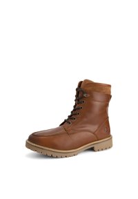 Bruine leren laars met een suede manchet, vetersluiting aan de voorkant, beige zool en textuurdetails. Heeft een ronde neus en een logo aan de zijkant.
