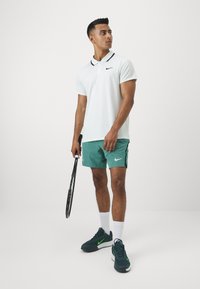 Nike Performance Poloshirt - barely green/black