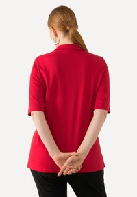 Ulla Popken SHORT SLEEVE - Poloshirt - salsa
