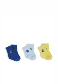 Trois paires de chaussettes en coton bleu, bleu clair et jaune, avec un logo d'arbre dans une couleur contrastante. Design à bord côtelé.