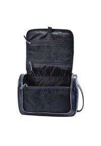 Borsa in pelle blu navy con chiusura a zip. L'interno presenta una fodera liscia, tre scomparti e una tasca in rete per un'ottimizzazione dell'organizzazione.