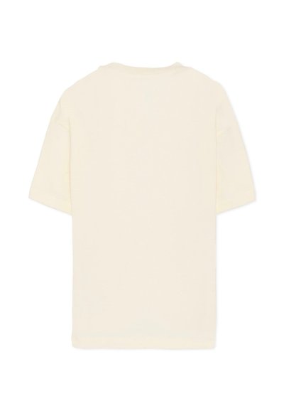 T-shirt di cotone color crema con maniche corte, scollo rotondo e vestibilità rilassata. Il tessuto è liscio, senza motivi o dettagli visibili.