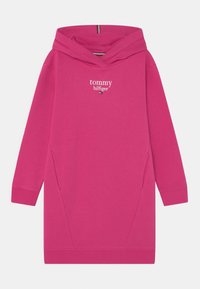 Roze hoodie met een losse pasvorm, zijzakken, geribde manchetten en een witte "tommy hilfiger" logo op de borst. Zacht materiaal.