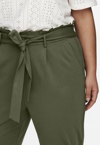 ONLY Carmakoma Nadrágok - kalamata