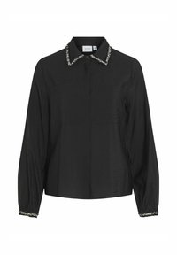 Black shirt with a collared neckline, two front pockets, and long sleeves. Features a textured fabric and a decorative trim on the collar and cuffs.