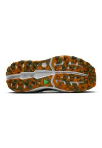 Trail running shoe outsole featuring multidirectional orange and green lugs, white midsole, and textured surface.  Rubber and synthetic materials used.