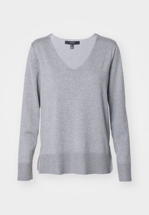 Halli kudumisjakk V-kaelusega, pikkade varrukatega, ribatud äärega ning külgsisselõigetega. Sile tekstuur, keskmine kaal ja juhuslik disain.