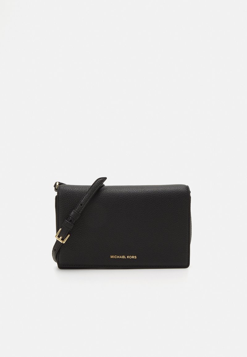 Black leather crossbody bag with a textured finish, gold hardware, and adjustable strap; embossed brand name on the front.