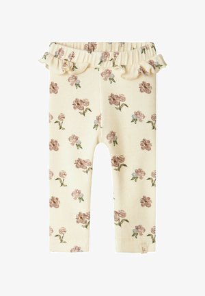 Ribbed leggings with a floral pattern in soft pink and green on a pale yellow background. Features a ruffled waistband and elastic fit.