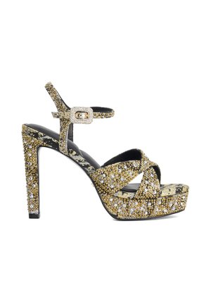 High-heeled open-toe sandal with gold and silver rhinestones, crossed straps, platform sole, ankle strap, and rhinestone-encrusted buckle.