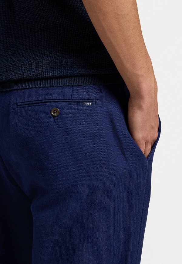 STRAIGHT FIT HOUNDSTOOTH TWILL TROUSER - Trousers2