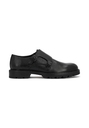 Schwarzer Ledermonkstrap-Schuh mit doppelten Schnallen und dicker Gummisohle, seitlich auf weißem Hintergrund gezeigt.