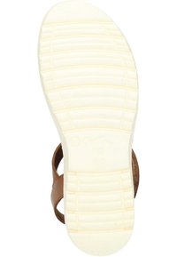 Brun lädersandal med en vit gummisula. Har en strukturerad sula, öppen design och flera remmar för stöd.