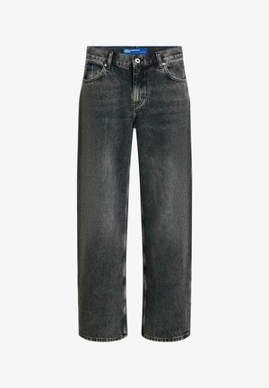 Mustad kõrge vöökohaga sirge säärega teksapüksid ees taskutega, nööpidega kinnitusega ja sinise sildiga vöö peal, millel on tekst "Karl Lagerfeld Jeans."