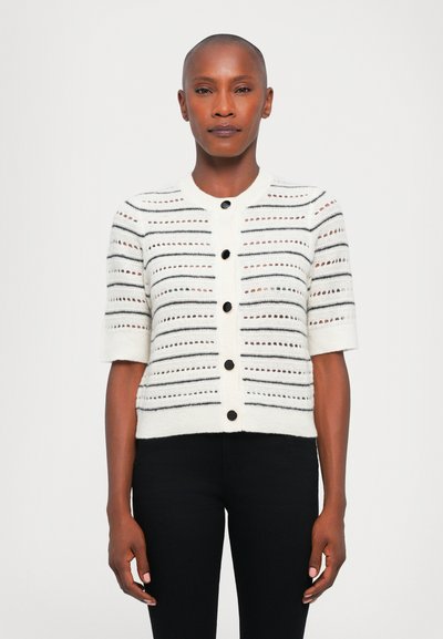 White knitted cardigan with short sleeves, featuring black horizontal stripes and openwork detailing, fastened with black buttons.