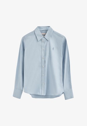 Lyseblå langærmet skjorte med knapper, spids krave og lille broderet polo-spiller-logo på brystet.