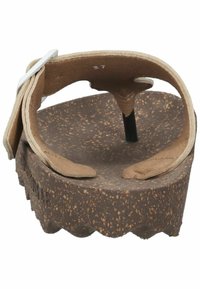 Sanda s korkovou podrážkou a hnědými koženými pásky a černým středovým sloupkem. Základna má vlnitý okraj a texturovaný povrch. Velikost 37.