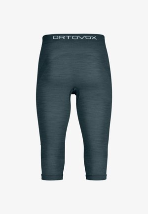 Dark grey capri leggings made of a textured material, featuring a high waistband with "ORTOVOX" logo at the top.