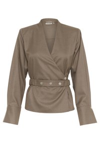 Haut à manches longues style cache-cœur en tissu marron. Dispose d'une taille ceinturée avec des boutons argentés en guise d'accents. Texture lisse, coupe ajustée et encolure en V.