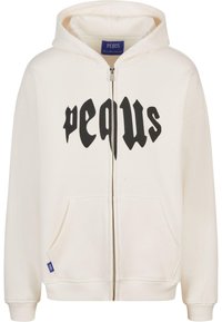 Crème hoodie met een frontale rits, grote zwarte grafische tekst "PEQUS" op de borst en zijzakken. Zacht materiaal met geribbelde manchetten.